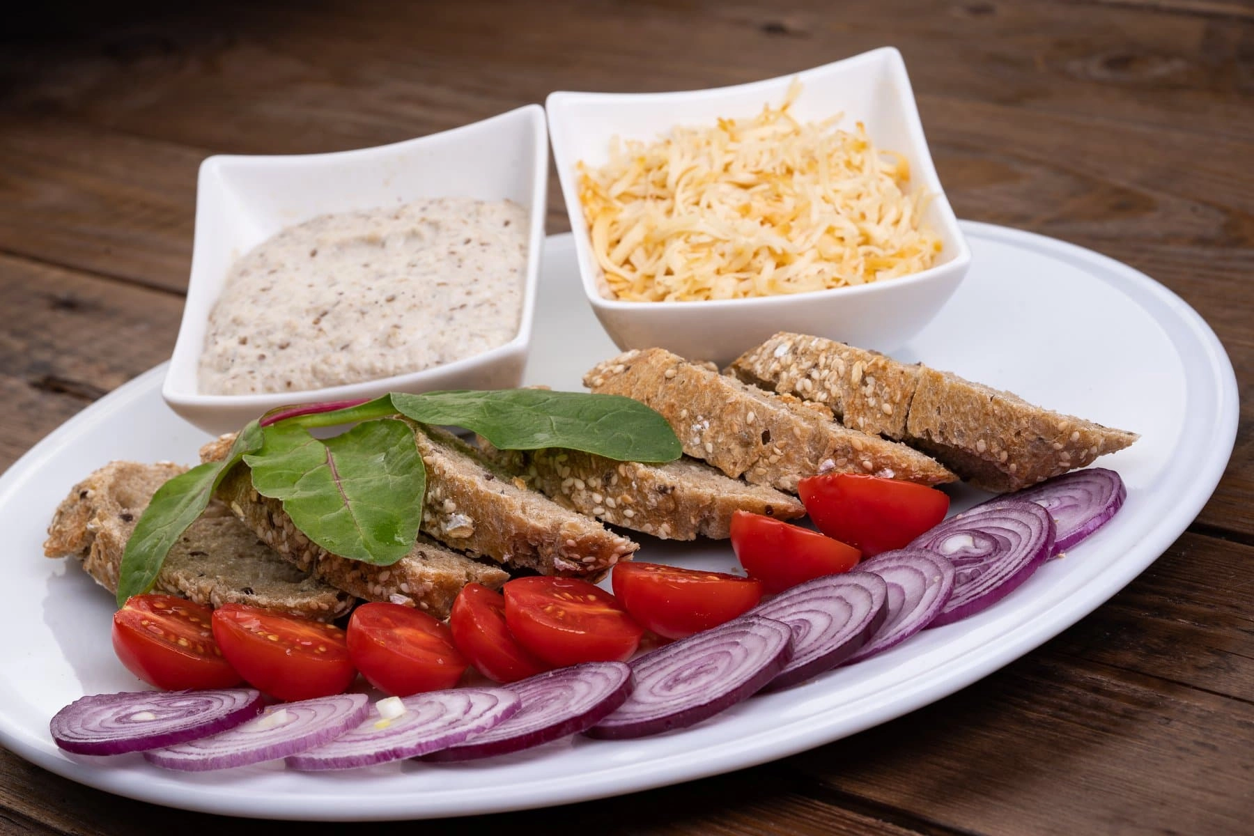 Gourmet cream with fresh vegetables, smoked cheese, multigrain bread